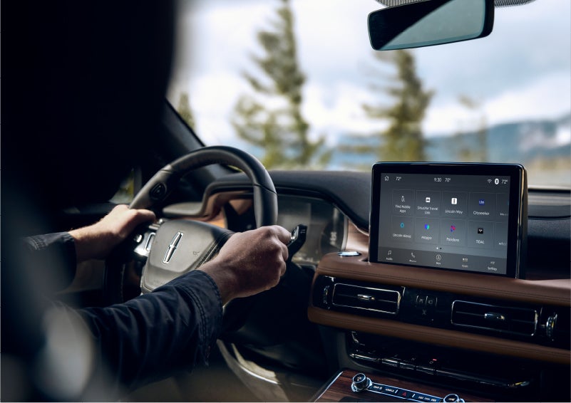 The Lincoln+Alexa app screen is displayed in the center screen of a 2023 Lincoln Aviator® Grand Touring SUV | Korum Lincoln in Puyallup WA