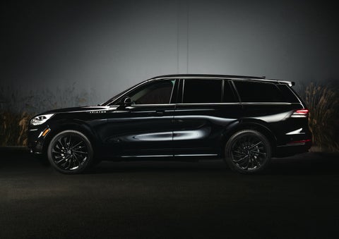 A 2024 Lincoln Aviator® SUV is shown in the Infinite Black exterior color | Korum Lincoln in Puyallup WA