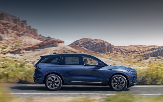 A 2024 Lincoln Nautilus® SUV is being driven in a desert setting. | Korum Lincoln in Puyallup WA