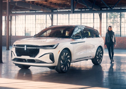 A person approaches a 2024 Lincoln Nautilus® SUV. | Korum Lincoln in Puyallup WA