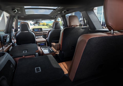 The interior of the 2025 Lincoln Aviator® SUV is shown with two seats folded down for added space. | Korum Lincoln in Puyallup WA