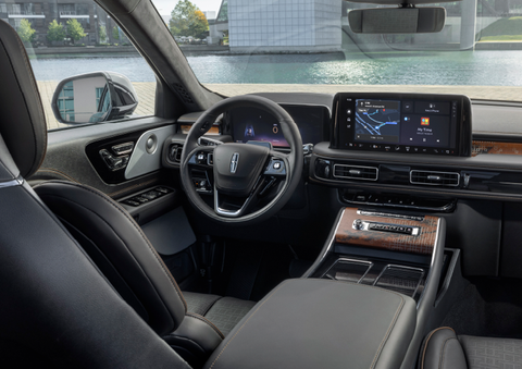 The interior of the 2025 Lincoln Aviator® SUV is shown parked with a view of a harbor through the windshield. | Korum Lincoln in Puyallup WA