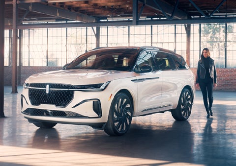 A person approaches a 2025 Lincoln Nautilus® SUV. | Korum Lincoln in Puyallup WA