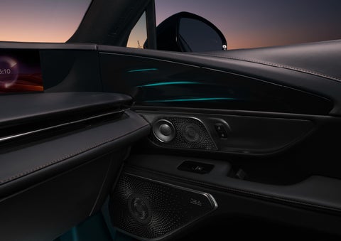 Selectable ambient lighting glows in the passenger door panel. | Korum Lincoln in Puyallup WA