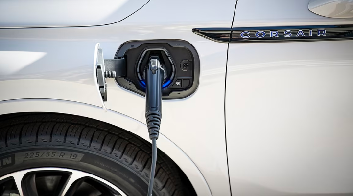 An electric charger is shown plugged into the charging port of a Lincoln Corsair® Grand Touring
model. | Korum Lincoln in Puyallup WA