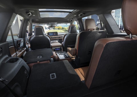 One side of the PowerFold® third-row seat and a second-row seat are folded forward in the 2026 Lincoln Aviator® SUV. | Korum Lincoln in Puyallup WA