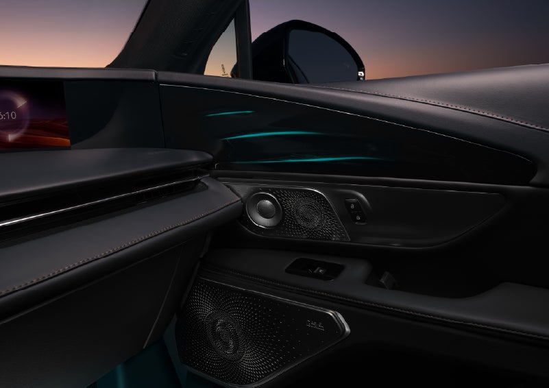 Selectable ambient lighting glows in the passenger door panel. | Korum Lincoln in Puyallup WA