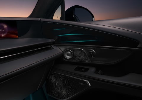 Selectable ambient lighting glows in the passenger door panel. | Korum Lincoln in Puyallup WA