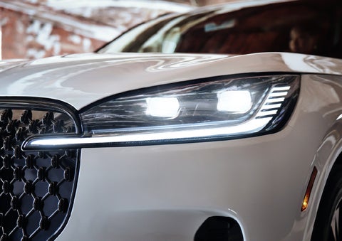 A close-up of a headlamp on the 2027 Lincoln Aviator® SUV is shown. | Korum Lincoln in Puyallup WA