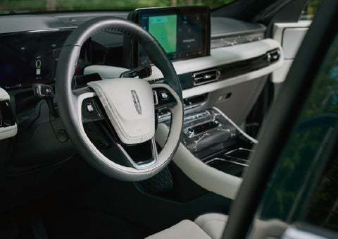 The leather-trimmed steering wheel of a 2027 Lincoln Aviator® Black Label™ SUV. | Korum Lincoln in Puyallup WA